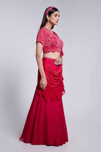 Beautifully Hand Embroidered Blouse Paired With A Fish Cut Skirt.