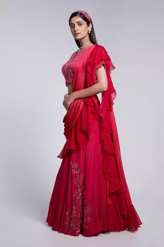 Beautifully Hand Embroidered Blouse Paired With A Fish Cut Skirt.