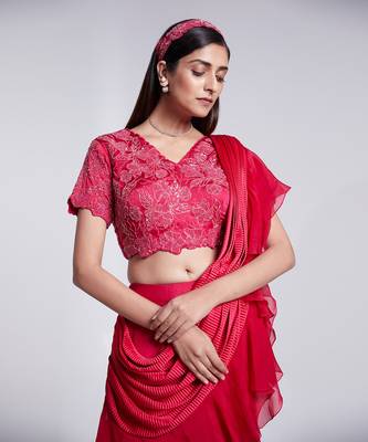 Beautifully Hand Embroidered Blouse Paired With A Fish Cut Skirt. 4