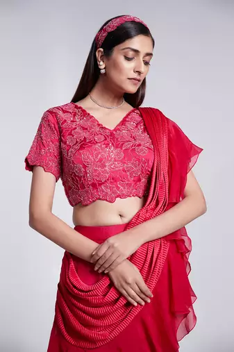 Beautifully Hand Embroidered Blouse Paired With A Fish Cut Skirt.