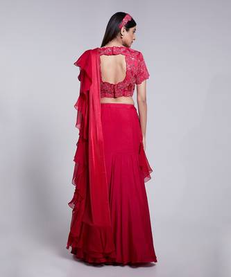 Beautifully Hand Embroidered Blouse Paired With A Fish Cut Skirt. 5