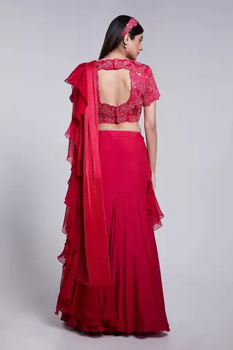 Beautifully Hand Embroidered Blouse Paired With A Fish Cut Skirt.