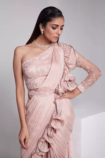 The Saree Is Pre Draped With A Seperate Embroidered Belt.
