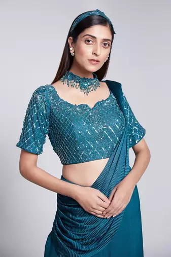 Beautifully Hand Crafted Blouse With Utmost Precision.