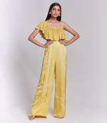 Jumpsuit With One Shoulder Ruffle Details The Pants Have Hand Embroidery