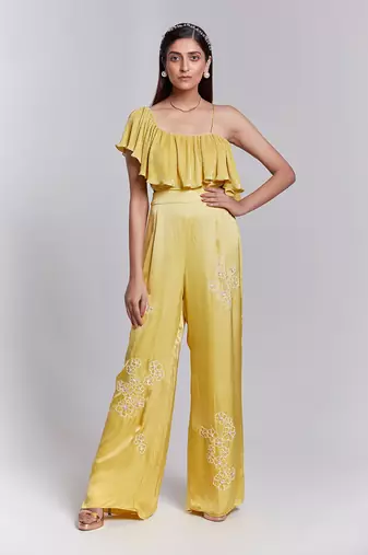 Jumpsuit With One Shoulder Ruffle Details The Pants Have Hand Embroidery