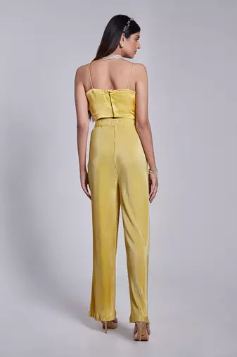 Beautiful Two Piece Set With Asymmetric Blouse Details The Pants Are In Crush Fabric