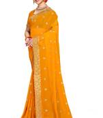 Mustard embroidered georgette saree with blouse