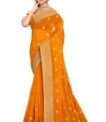Mustard embroidered georgette saree with blouse