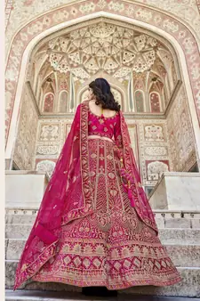 RANI PINK PREMIUM LUXURIOUS DESIGNER WEDDING WEAR VELVET LEHENGA CHOLI LATEST DESIGN 