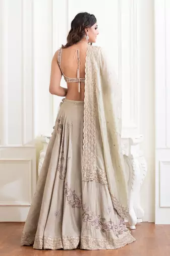 Baize Green Raw Silk Lehenga And Blouse
