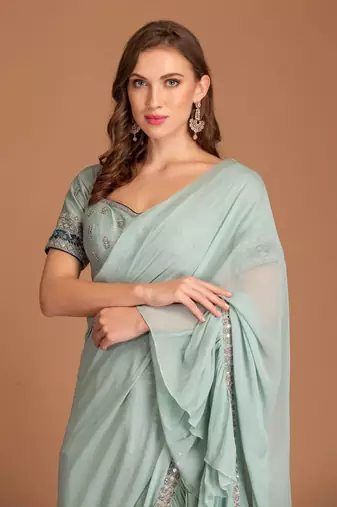Ice Blue Ruffle Saree Drapped With Mirror Work Border & Raw Silk Blouse With Resham & Dabka Work