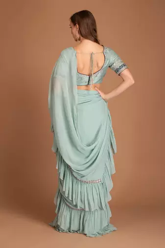Ice Blue Ruffle Saree Drapped With Mirror Work Border & Raw Silk Blouse With Resham & Dabka Work