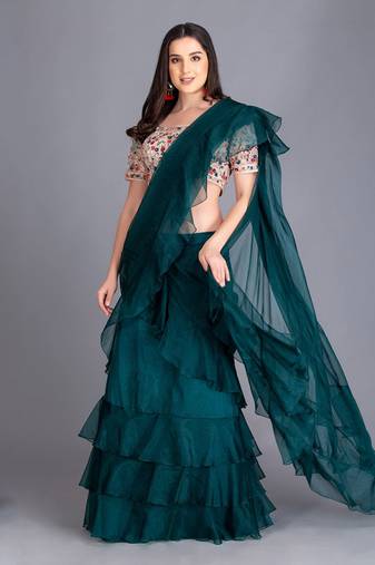 A Must Have For Your Word Ruffled Drapped Save With Multi Colour Thread Work Embroidery On The Blouse