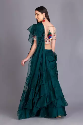 A Must Have For Your Word Ruffled Drapped Save With Multi Colour Thread Work Embroidery On The Blouse