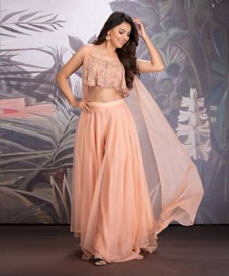 Peach Bloom Georgette Hand Embroidered Blouse Clubbed With Layered Organza Pants And Flared Organza Cape. 2