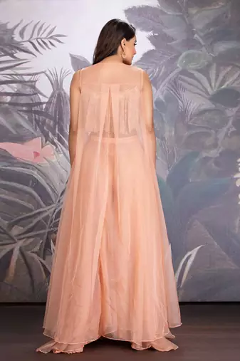 Peach Bloom Georgette Hand Embroidered Blouse Clubbed With Layered Organza Pants And Flared Organza Cape.