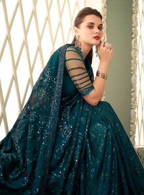 Teal embroidered georgette saree with blouse 2