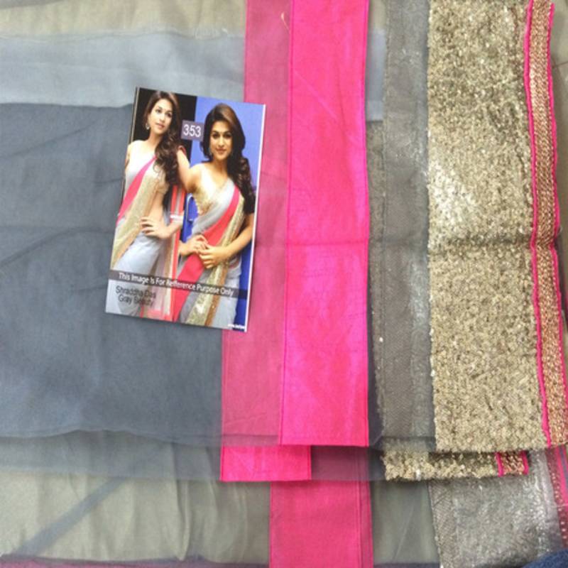 Shraddha Das Grey  and  Pink embroidered Net saree with blouse