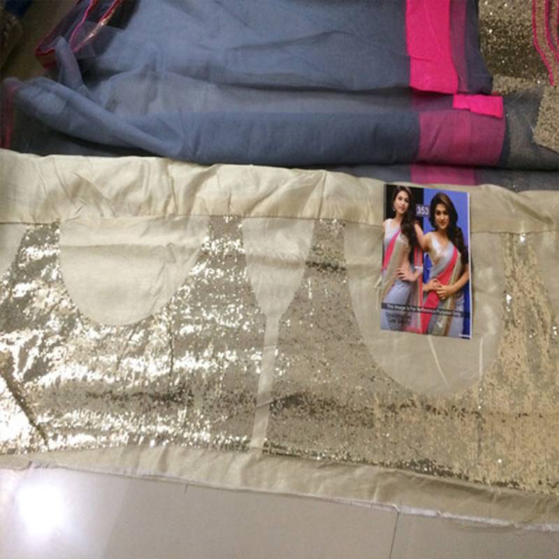 Shraddha Das Grey  and  Pink embroidered Net saree with blouse