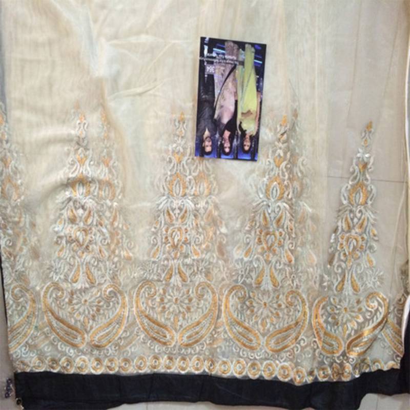 Madhuri Dixit Peach embroidered NET saree with blouse