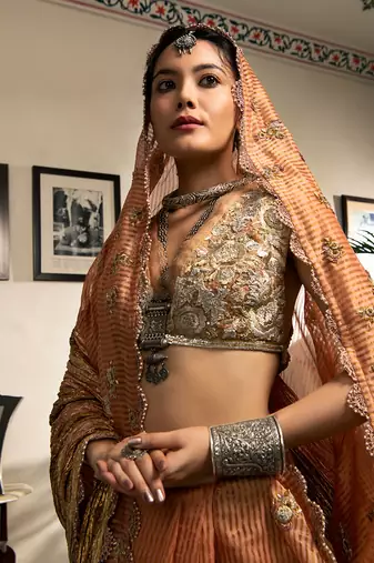 Peach Gota Half Saree With Gold Woven Stripes Gold And Bronze Zardozi Work Blouse And Dupatta With Scallop Detailing.