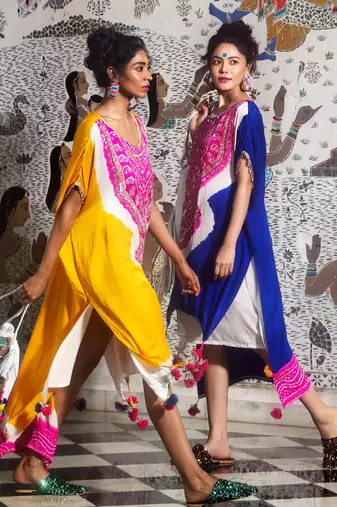 Cobalt blue and fuchsia high- low double layered kaftan embellished with gota, mirrors and drawstring details.
