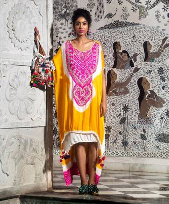 Golden yellow high-low double layered kaftan embellished with gota, mirrors and drawstring details. 1
