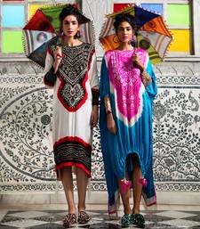 White gajji silk kaftan with gota and mirror embellished neck, tassels at the hem.