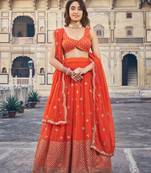 Orange Georgette Semi-Stitched Lehenga and Unstitched Blouse With Dupatta