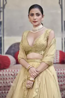 Gold Toned  Georgette  Semi-Stitched Lehenga and Unstitched Blouse With Dupatta