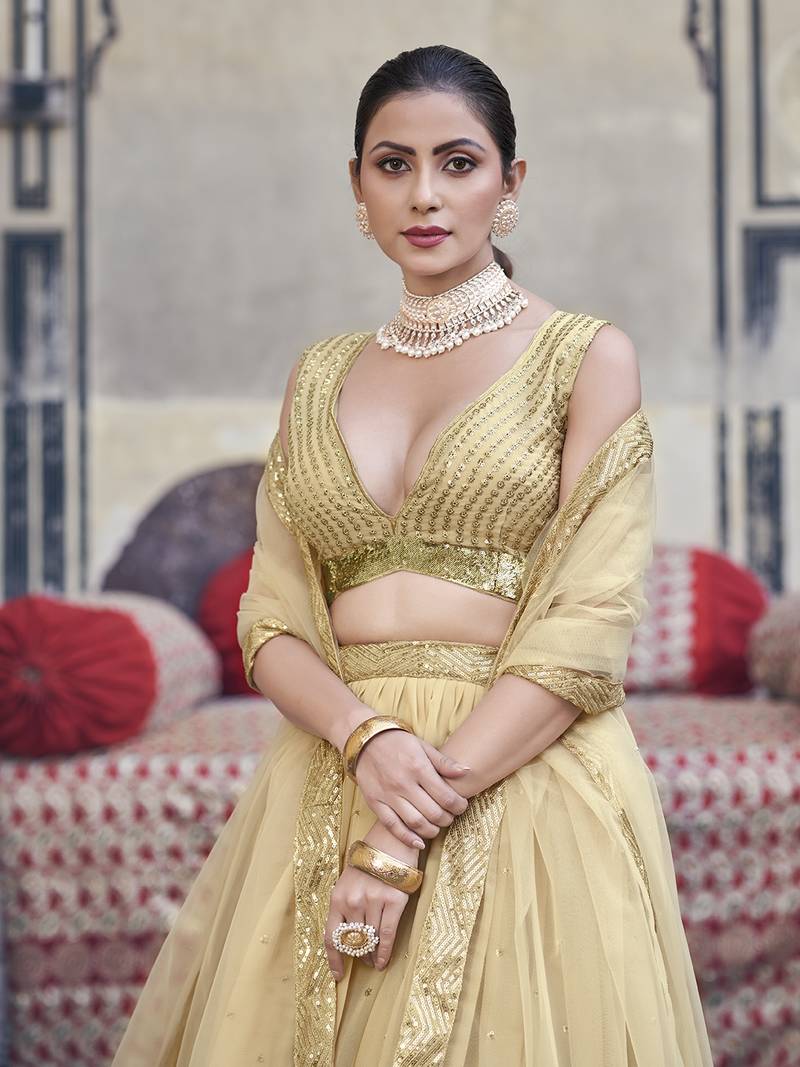 Gold Toned  Georgette  Semi-Stitched Lehenga and Unstitched Blouse With Dupatta