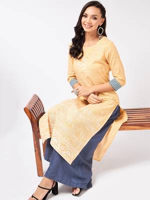 Yellow printed cotton kurtas-and-kurtis 5