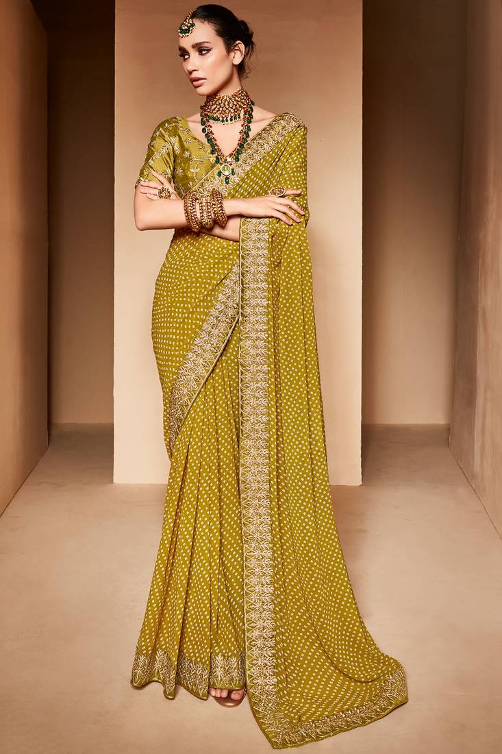 Gorgeous Mustard Yellow Georgette Saree With Designer Blouse
