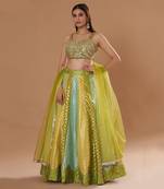 Mirrorwork Fully Embroidered Choli With A Turquoise,Yellow And Lime Green Mehendi Lehenga.
