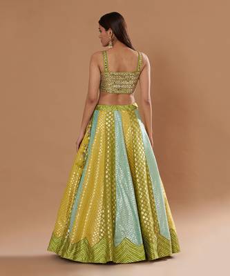Mirrorwork Fully Embroidered Choli With A Turquoise,Yellow And Lime Green Mehendi Lehenga. 2