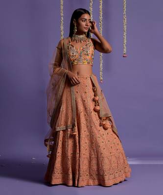 Dusky Peach Heavy Embroidered Lehenga With Light V Neck Crop Top 1