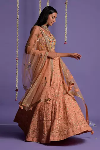 Dusky Peach Heavy Embroidered Lehenga With Light V Neck Crop Top
