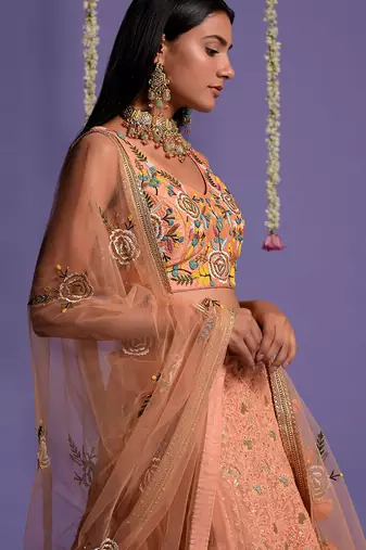 Dusky Peach Heavy Embroidered Lehenga With Light V Neck Crop Top