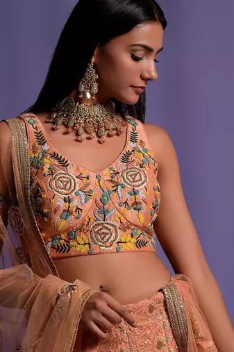 Dusky Peach Heavy Embroidered Lehenga With Light V Neck Crop Top