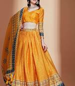 Yellow embroidered silk semi stitched lehenga