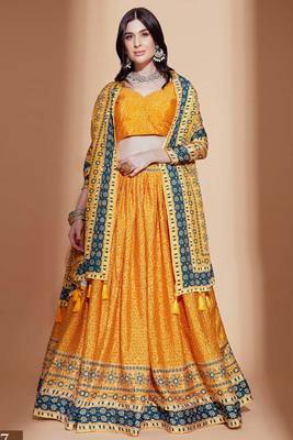 Yellow embroidered silk semi stitched lehenga 2