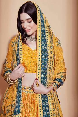 Yellow embroidered silk semi stitched lehenga 3