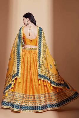 Yellow embroidered silk semi stitched lehenga 4