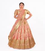 Graceful Pleated Banarasi Lehenga Choli In Pink Organza With Embellished Unstitched Blouse & Matching Dupatta.