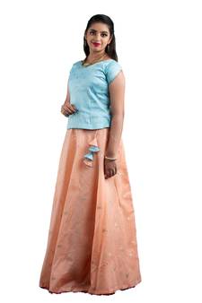 peach chanderi pavadai set with solid work design