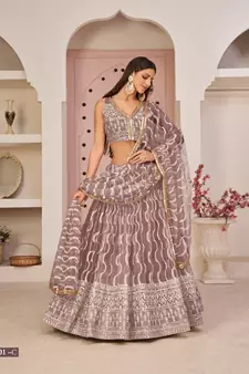 Pink embroidered net semi stitched lehenga