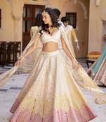 Dazzling Off-white Thread embroidered with papep mirror work georgette semi stitched lehenga choli with wedding