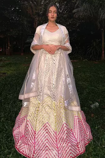 Dazzling Off-white Thread embroidered with papep mirror work georgette semi stitched lehenga choli with wedding