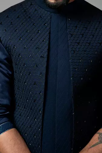 Navy blue Nehru jacket with Honeycomb pattern embroidery highlighted with panel detailing.